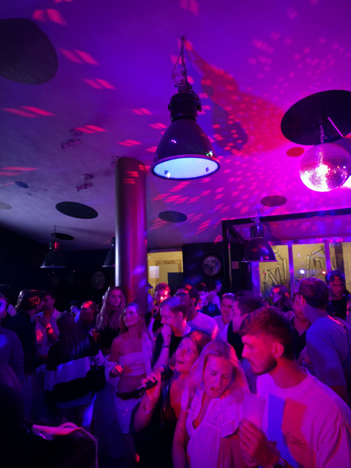 Guests singing karaoke at The Spot Lisboa
