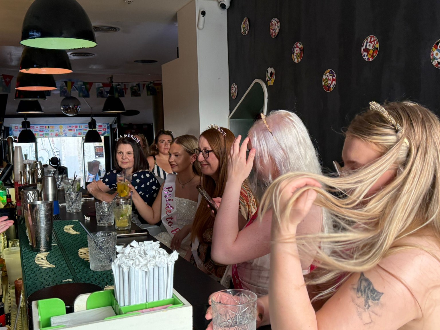 Guests enjoying a cocktail masterclass at The Spot Lisboa
