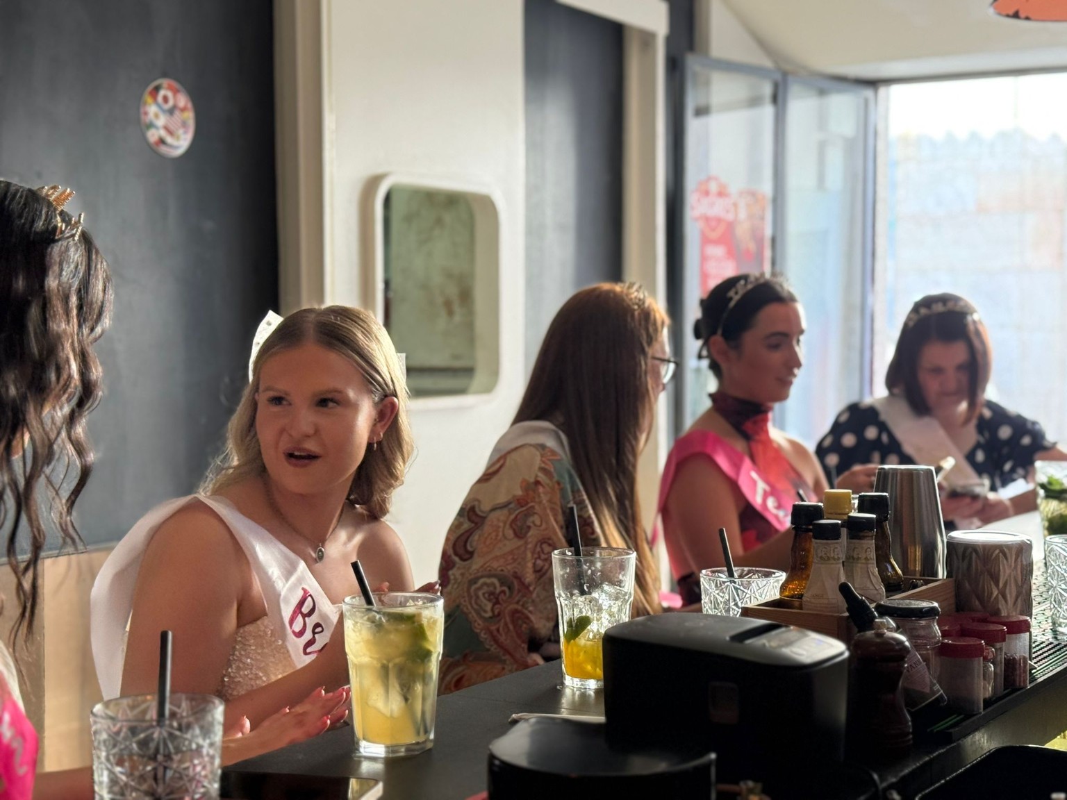 Guests enjoying a cocktail masterclass at The Spot Lisboa