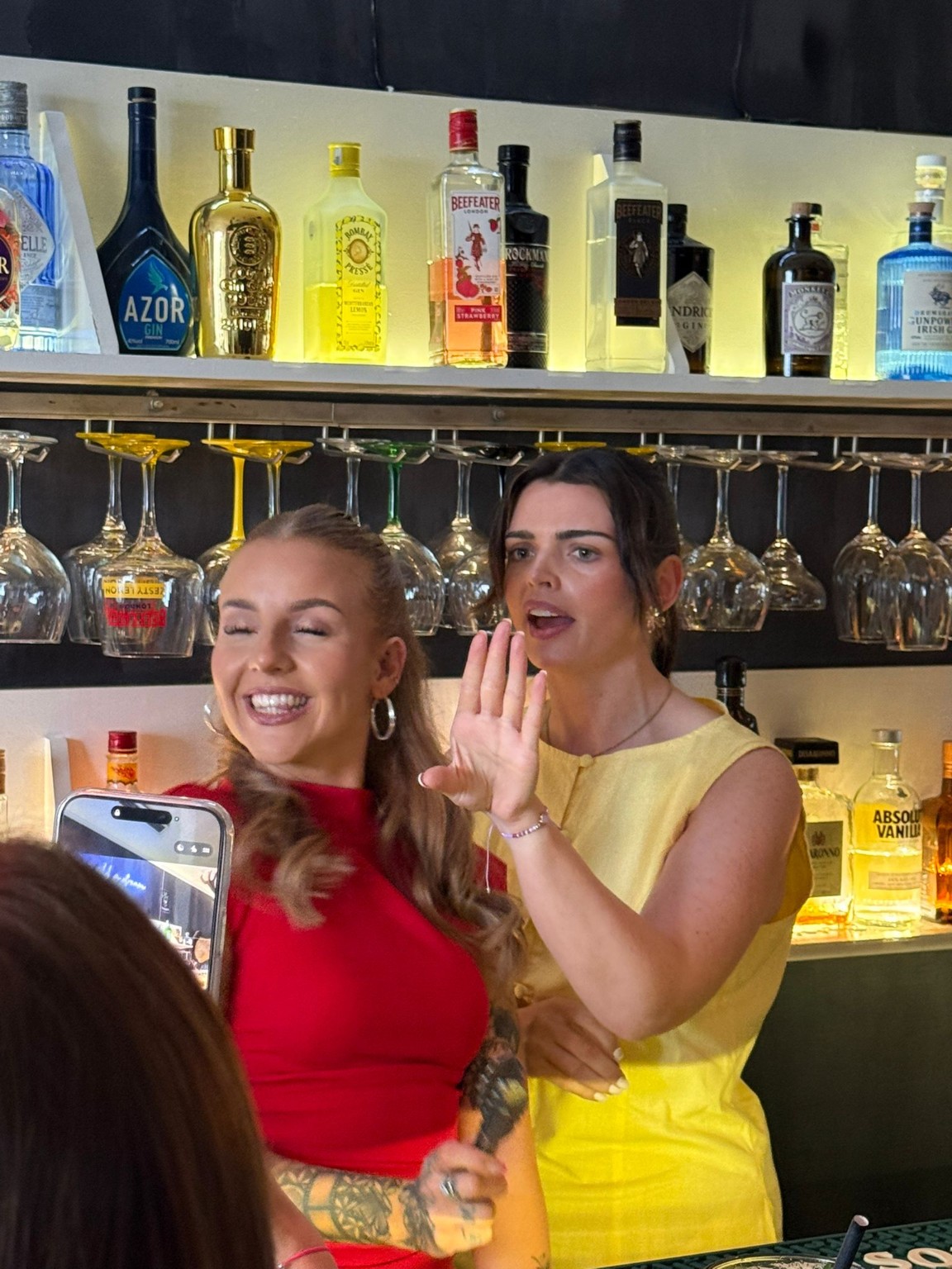 Guests enjoying a cocktail masterclass at The Spot Lisboa