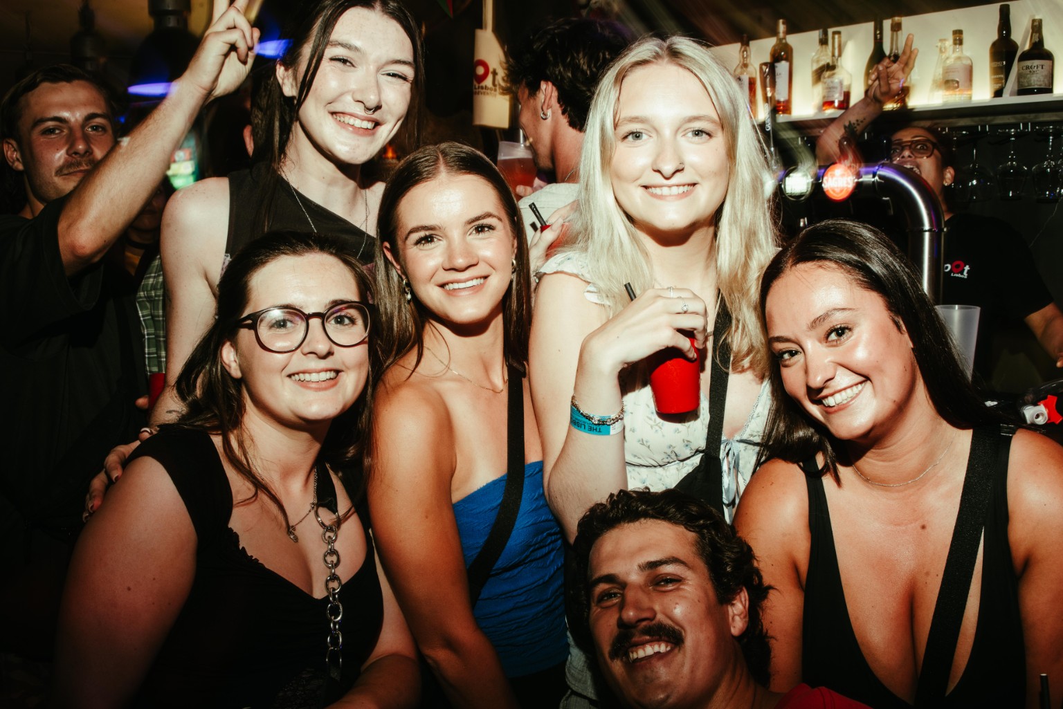 Friends celebrating at The Spot Lisboa